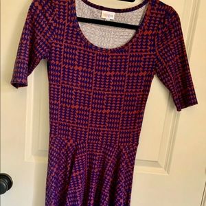 LulaRoe Nicole dress with purple and pink pattern